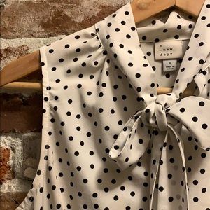 Polka dot sleeveless blouse